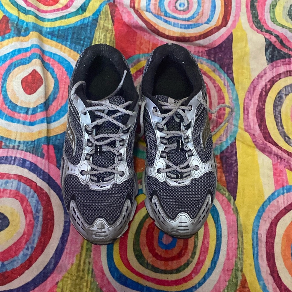 Gray and black Saucony running shoes